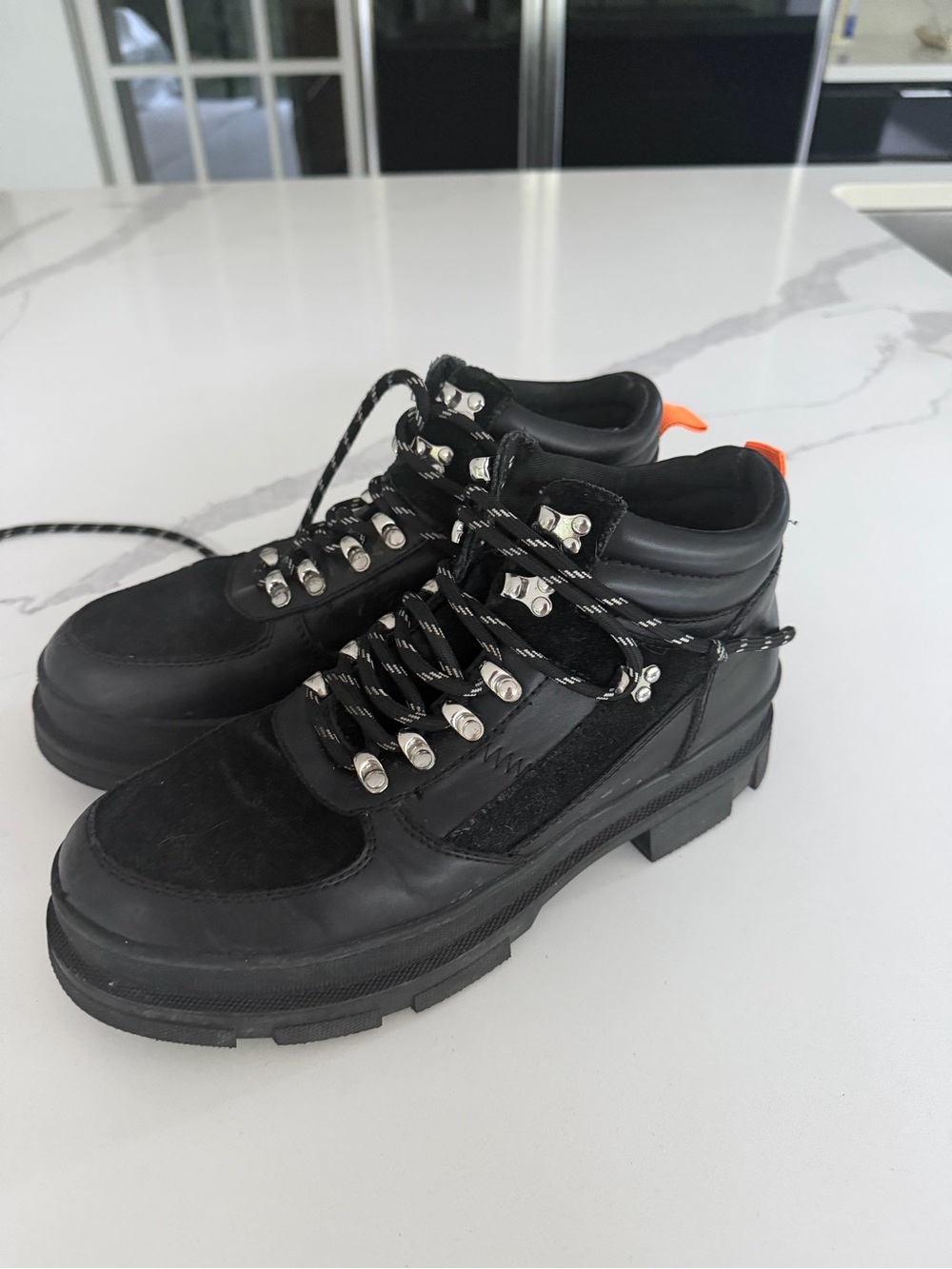 Aqua Women’s Black Chunky Lace-Up Moto Boots with Orange Tab